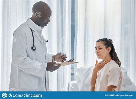 Doctor Healthcare Worker And Medical Professional Consulting With Sick