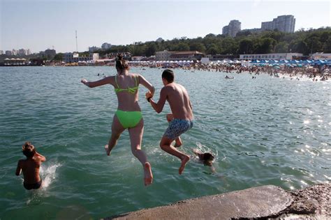 In Russia And Ukraine No Social Distance On Crowded Beaches