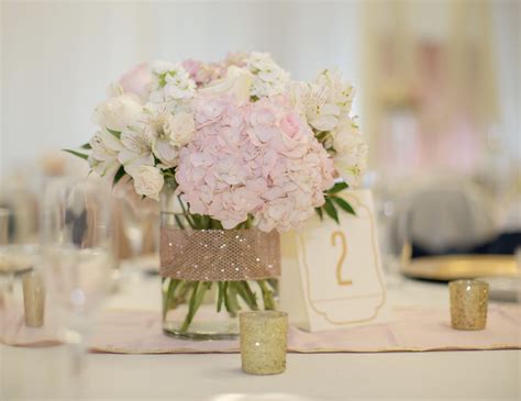 Blush Pink Hydrangeas Roses And Stock With A Rose Gold Ribbon Pink Hydrangea Centerpieces