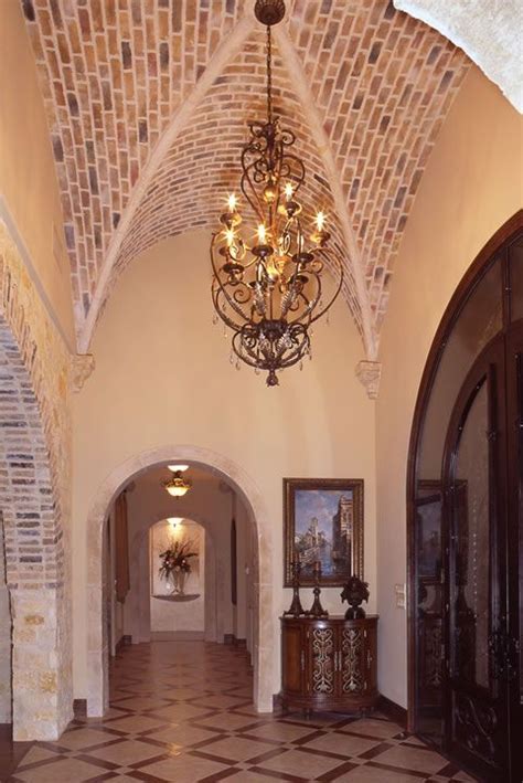 Archways and ceilings solved this problem by creating a. Brick groin vault ceiling... | Custom built homes, Vaulted ...