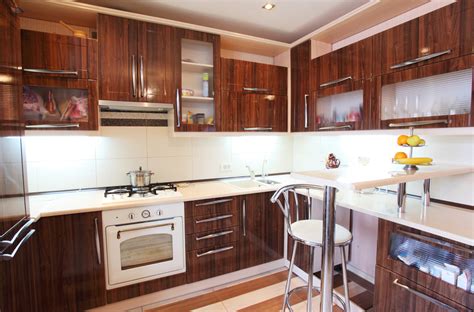 The following ideas show how white cabinets can make your kitchen more visually interesting. Remodeling ContractorModern Wood Kitchen Designs - Remodeling Contractor