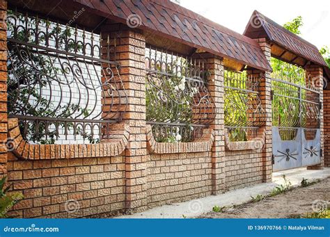Beautiful Brick And Metal Fence With Door And Gate Of Modern Style