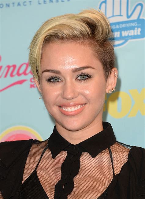 It's generally considered bad manners to wear a beanie indoors, especially at the dinner table. Miley Cyrus Is Already Sick of Her Short Hair | StyleCaster