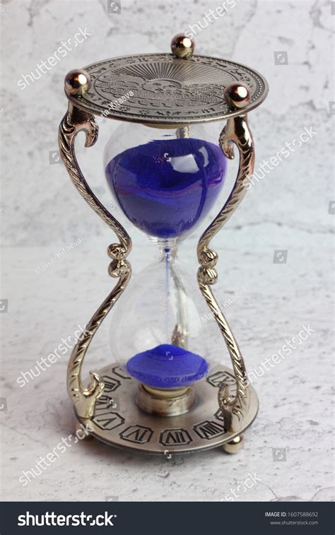 Beautiful Vintage Antique Hourglass Blue Sand Stock Photo 1607588692