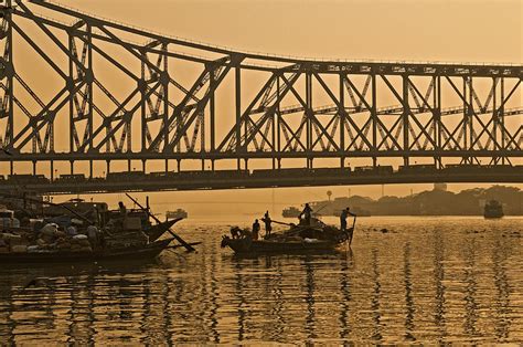 Calcutta Hooghlyriver And Howrah Bridge At Sunset Photograph By Urs
