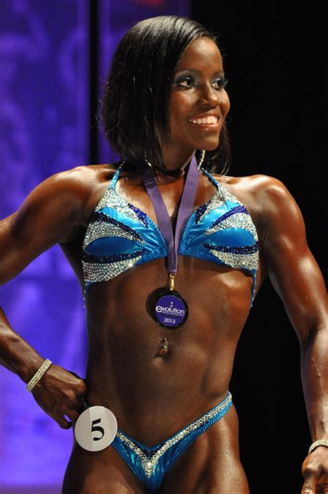 Beautiful woman with perfect legs. Black female bodybuilders