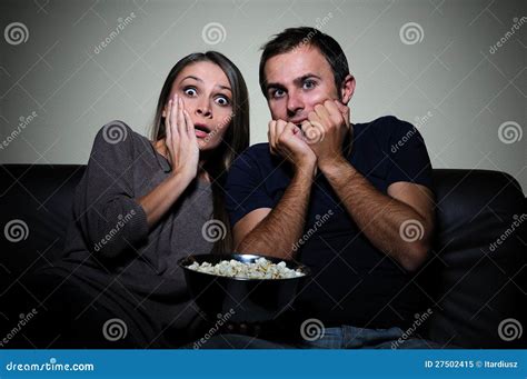 Young Couple Watching Scary Movie On Tv Stock Image Image Of Girl