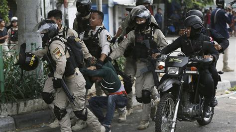indonesia s president says riots under control after six killed in violence bt