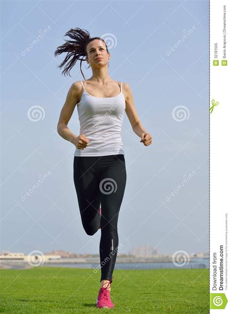 Young Beautiful Woman Jogging On Morning Royalty Free