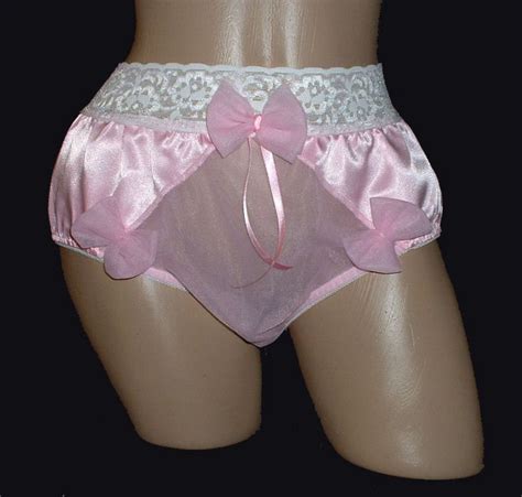 pink satin sissy panties with a sheer panel in front mistress could easily have sissy lift the