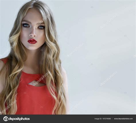 Blonde Model Girl With Long Curly Hair — Stock Photo © Sofiazhuravets