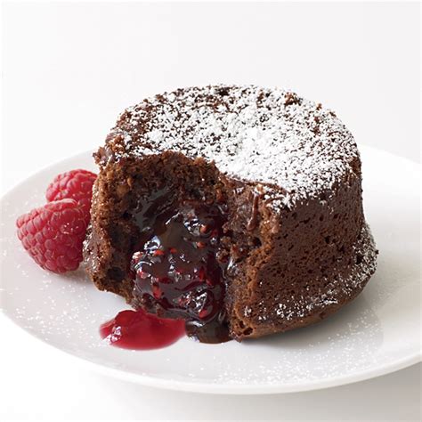 Adding cream cheese to chocolate bundt cake makes for a delish cake! Molten Chocolate Cake with Raspberry Filling Recipe - Grace Parisi | Food & Wine