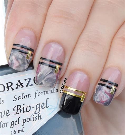 Marble nails in black and white look very chic black marble nails fit many occasions and maybe are even suitable for work pink, grey and white marbelized nail design Marble Inspired Gray And Pink Nails Pictures, Photos, and ...