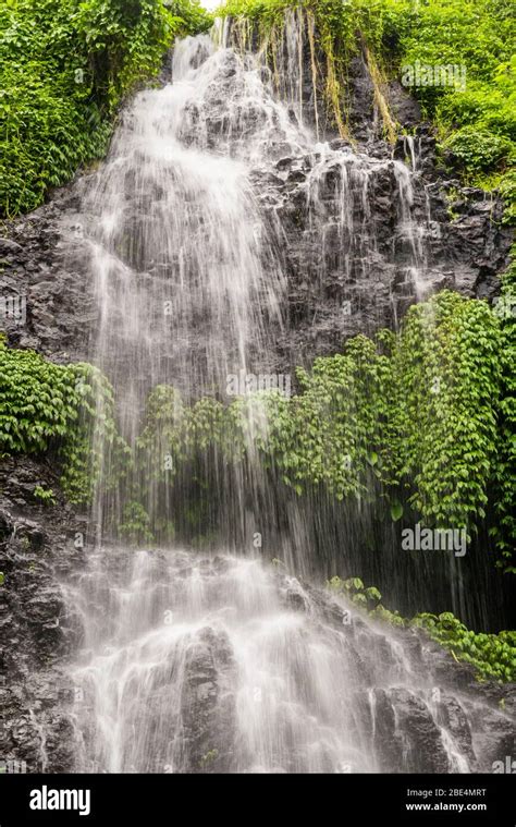 Vertical Close Up Of Banyumala Waterfalls In Bali Indonesia Stock