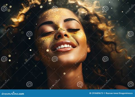 Beautiful Woman Smiling With Golden Glitter Particles Adorning Her Hair