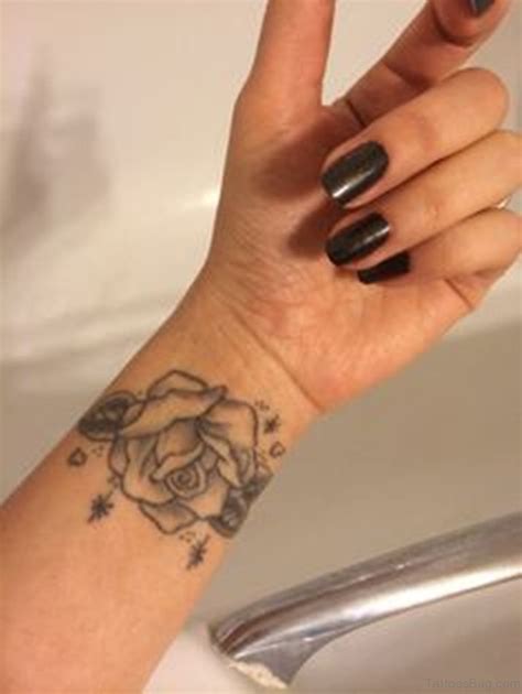 15 Delightful Black Rose Tattoos On Wrist Tattoo Designs