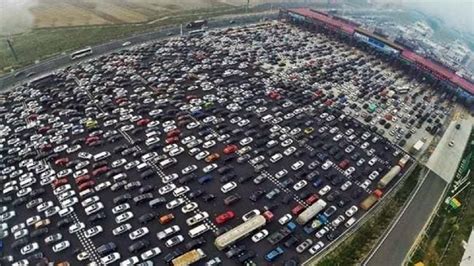 Chinese Motorists Stranded In 50 Lane Traffic Jam During Long Weekend Rush