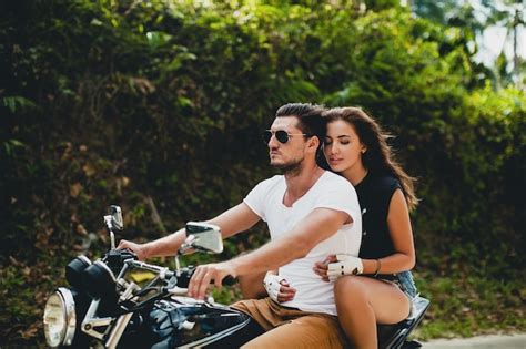 Free Photo Young Couple In Love Riding A Motorcycle