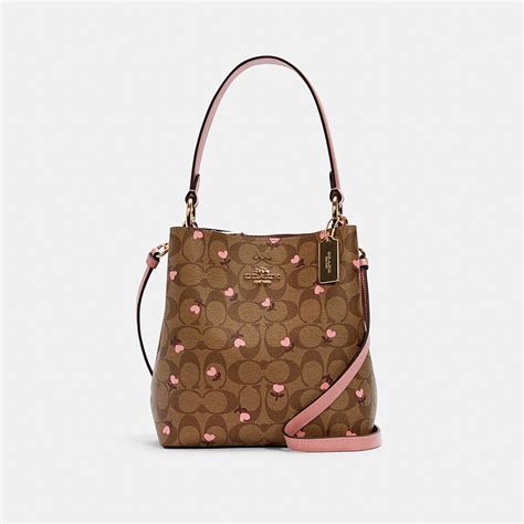 COACH® Outlet | SMALL TOWN BUCKET BAG IN SIGNATURE CANVAS WITH HEART ...