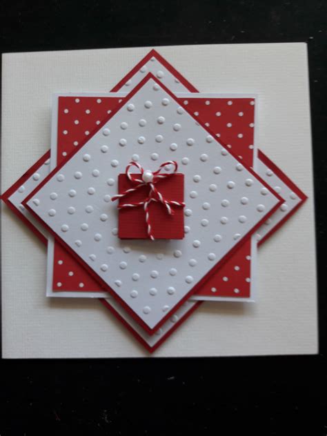 A Red And White Card With A Bow On It