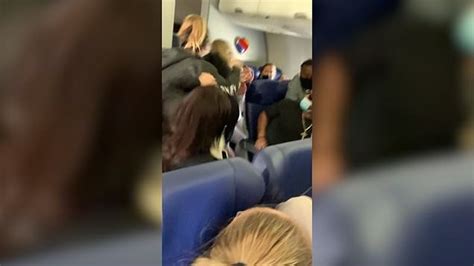 watch enraged passenger hits flight attendant knocking out two of her teeth metro video