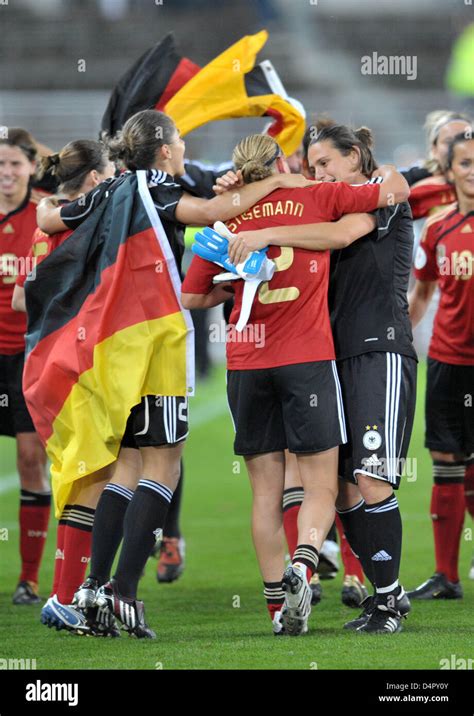 Germanys Goalie Nadine Angerer R Embraces Kerstin Stegemann C After The Uefa Womens Euro
