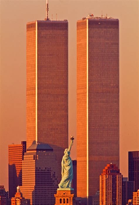 Statue Of Liberty Between Twin Towers World Trade Center At Sunset