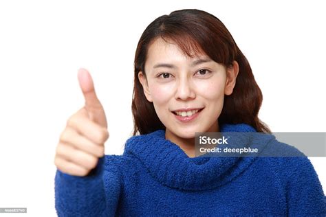 Woman With Thumbs Up Gesture Stock Photo Download Image Now 20 29
