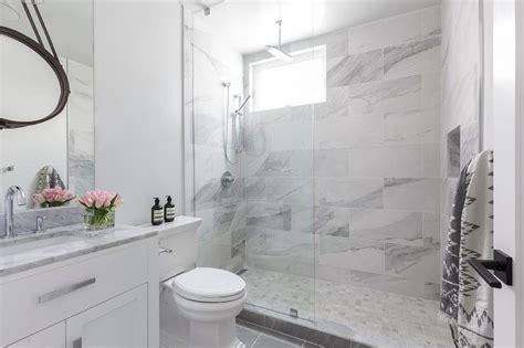 Large rectangular concrete tiles in this bathroom add an industrial look to the space and help make the room appear taller with their vertical lines. Brown Shower Floor Tiles Design Ideas