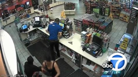 Couple Caught On Camera Robbing A Compton Store At Gunpoint Wow Video