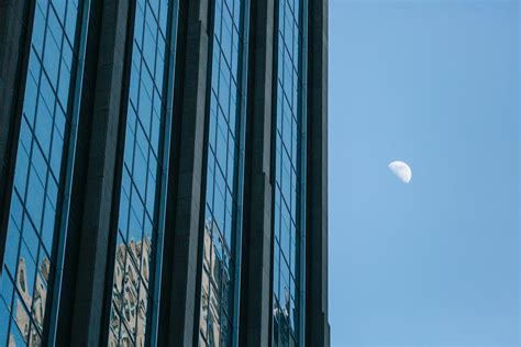Contemporary Building Against Cloudless Blue Sky With Moon · Free Stock