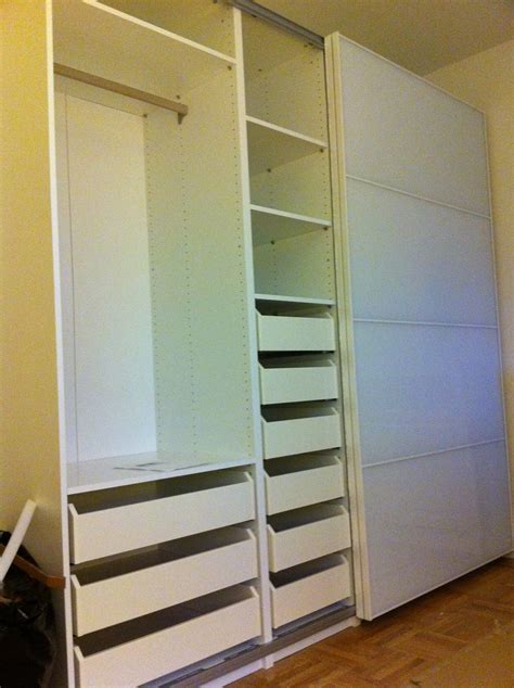 In the end we never did install doors… we liked the look of the wardrobes without them. IKEA Pax Wardrobe with Drawers - White | IKEA Pax Wardrobe ...