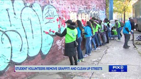 Student Volunteers Help Remove Graffiti And Clean Up Bronx Streets