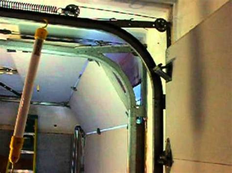 Most also include a handheld radio remote control carried by the owner, which can be used to open and close the door from a short distance. Garage Door Opening and Closing - YouTube