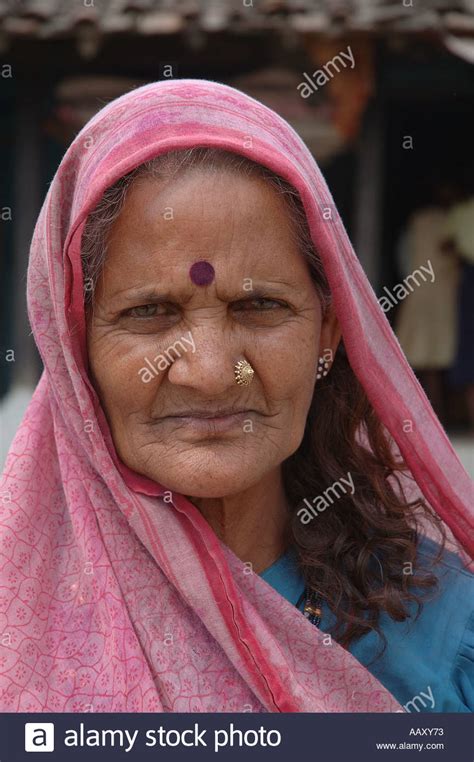 Indian Village Woman In Pink Saree And Red Bindi In Village Manghawa