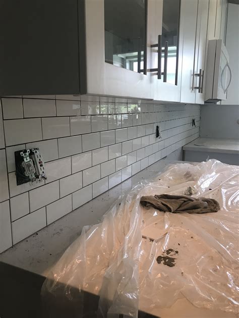 I cut spacers out of scrap tile that is the exact same size as the glass accents, so i can install the wall tile first. Subway tile kitchen backsplash 1/16 spacers used | Subway ...