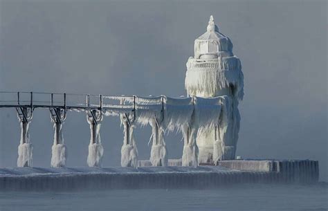 Iced Over Lake Michigan Lighthouse Looks Like Magical Ice Palace In