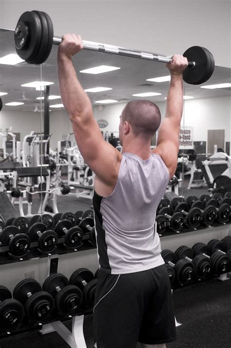 Men Exercise Free Stock Photo A Healthy Young Man Lifting Weights