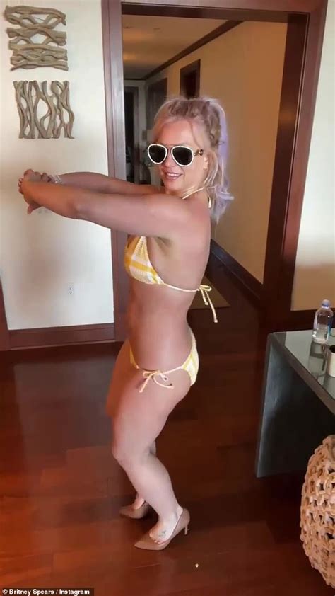 Britney Spears Dances In Yellow Thong Bikini And Writes Of Raising Hell As Family War Rumbles