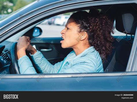 Rude Black Woman Driver Arguing And Driving Car Image And Stock Photo