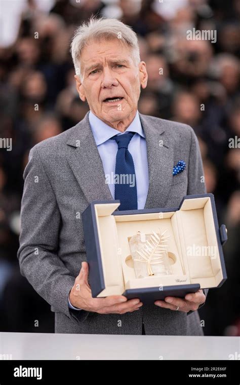 Harrison Ford Poses For Photographers With His Honorary Palme D Or At
