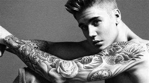 In the video footage accompanying his gq cover, justin bieber explains the significance of many of his tattoos. Should Justin Bieber Remove His Selena Gomez TATTOO ...