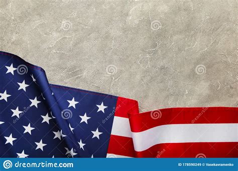 American Flag On Grey Concrete Background With Copy Space Stock Image