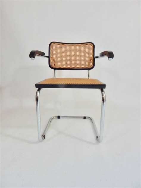 Be aware that there are many different manufacturers of this. 1960s Black Marcel Breuer Cesca Chairs, Italy at 1stdibs