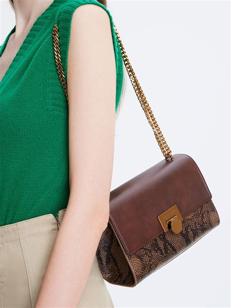 Brown Snake Print Chain Strap Clutch Charles And Keith International