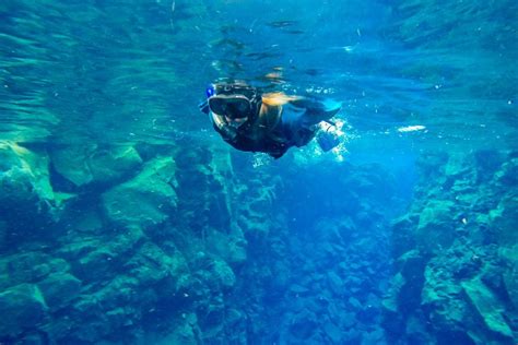 Snorkeling The Silfra Fissure In Iceland • The Blonde Abroad Snorkeling Iceland Snorkelling