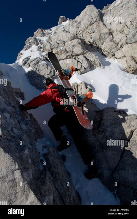 Hiking In The Snowy Mountains Stock Photo Alamy