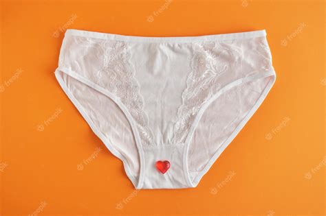 premium photo hearts and white woman panties woman health and love yourself concept