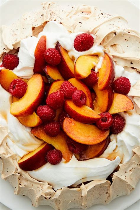 Overbeaten egg whites lose volume and deflate when folded into other ingredients. Raspberry Pavlova With Peaches and Cream Recipe | Recipe | Peaches and cream recipe, Cream ...