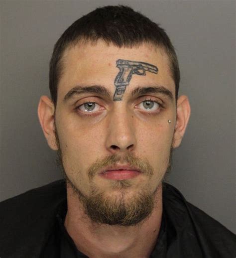 Man With Gun Tattoo On His Forehead Charged With Possession Firearm
